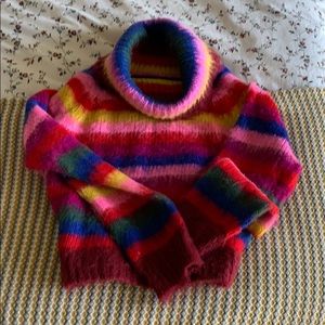 Multi-colored Turtleneck sweater.